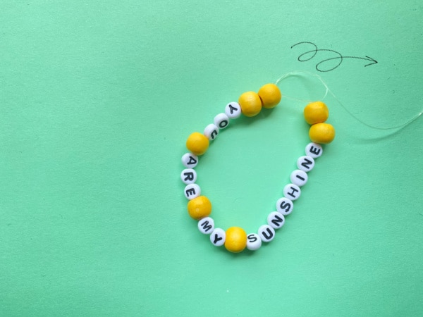 surgeons knot in summer bracelet