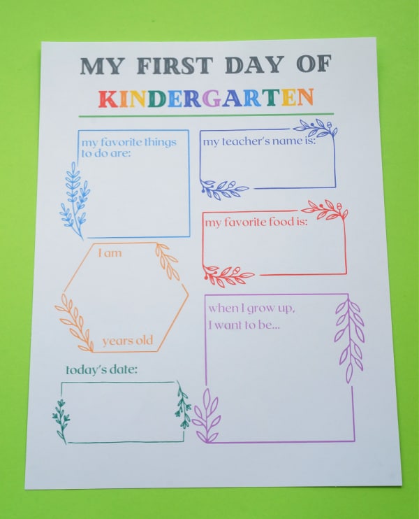 first day of kindergarten printable sign printed out on paper