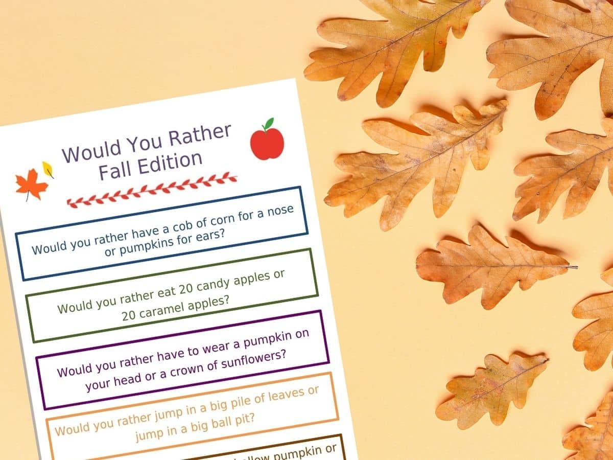 fall would you rather questions for kids printed out with fall leaves