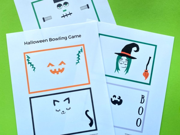 halloween bowling game printables on green background