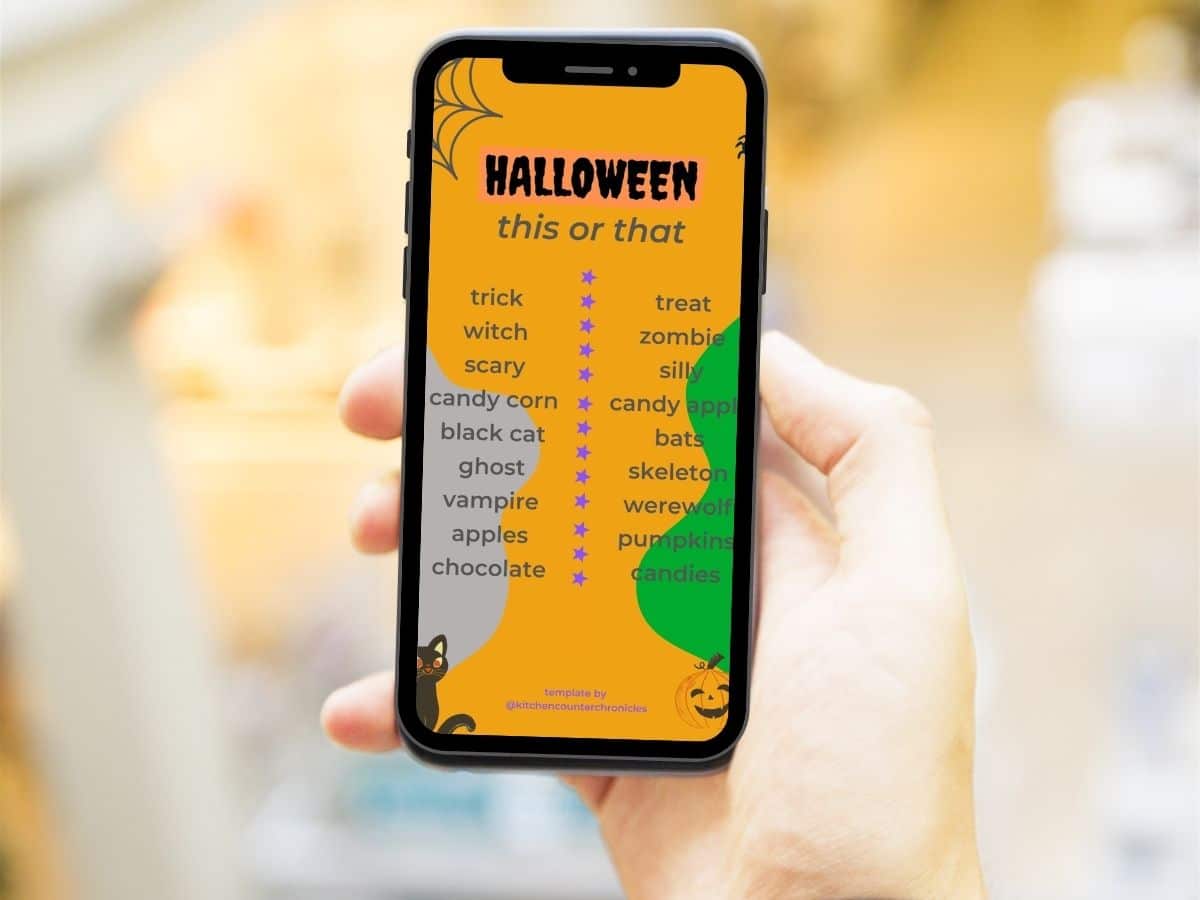 halloween this or that instagram story template on cell phone in person's hand