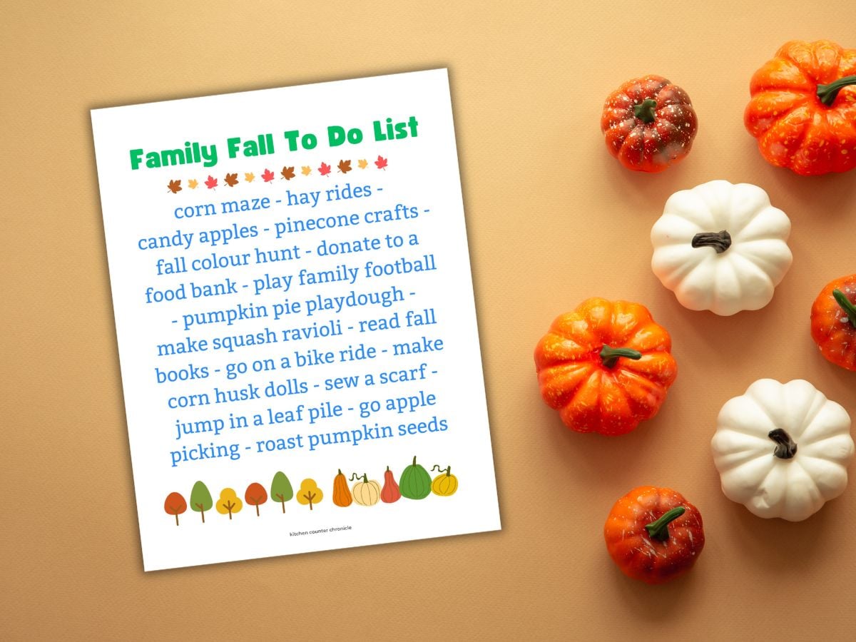 newly updated fun fall family bucket list printable poster surrounded by pumpkins