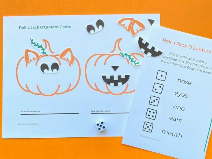 roll a jack olantern game being played with pieces and die