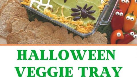 Halloween veggie tray with 7 layer dip and pumpkin tortilla chips and title card