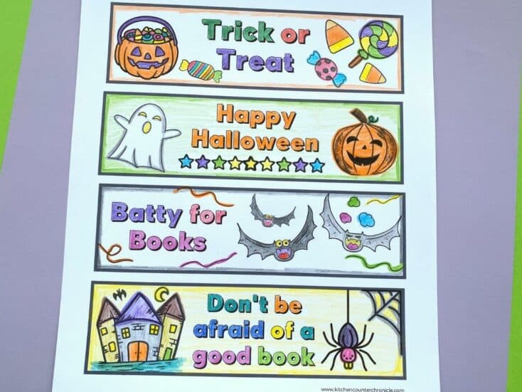 halloween colouring bookmarks coloured in on paper