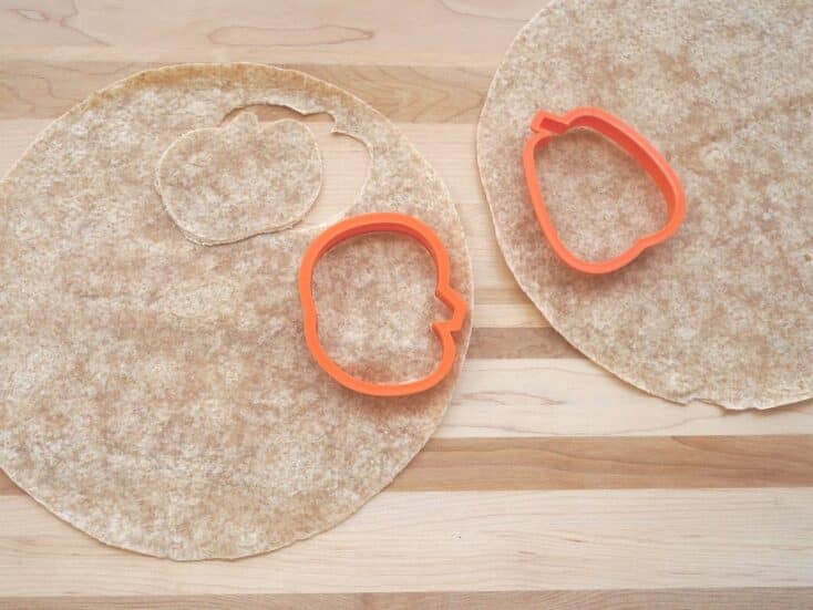 pumpkin cookie cutters on tortillas