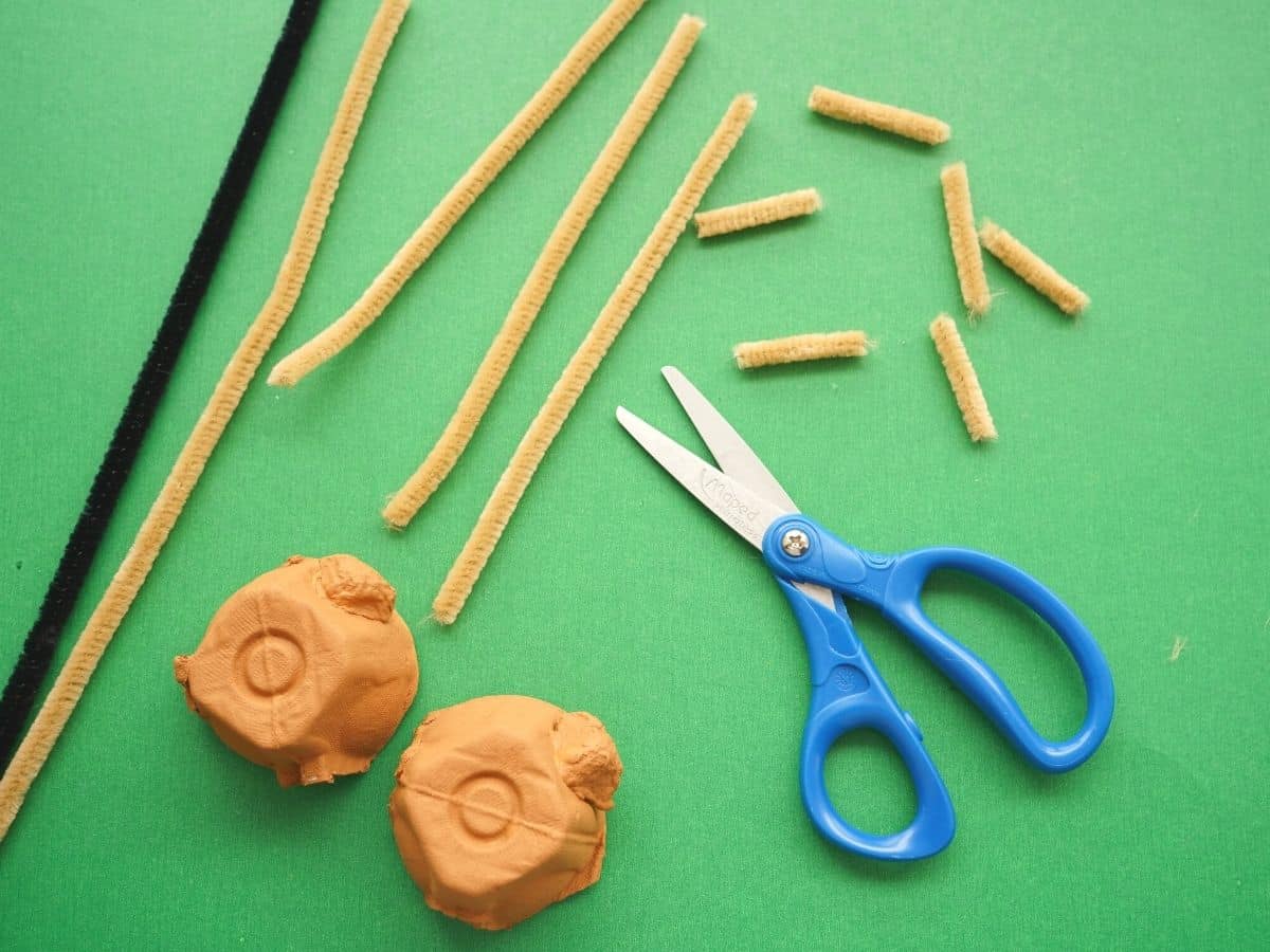 egg carton painted brown with brown pipe cleaners cut into reindeer antlers