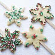 snowflake christmas cookie on a stick decorated