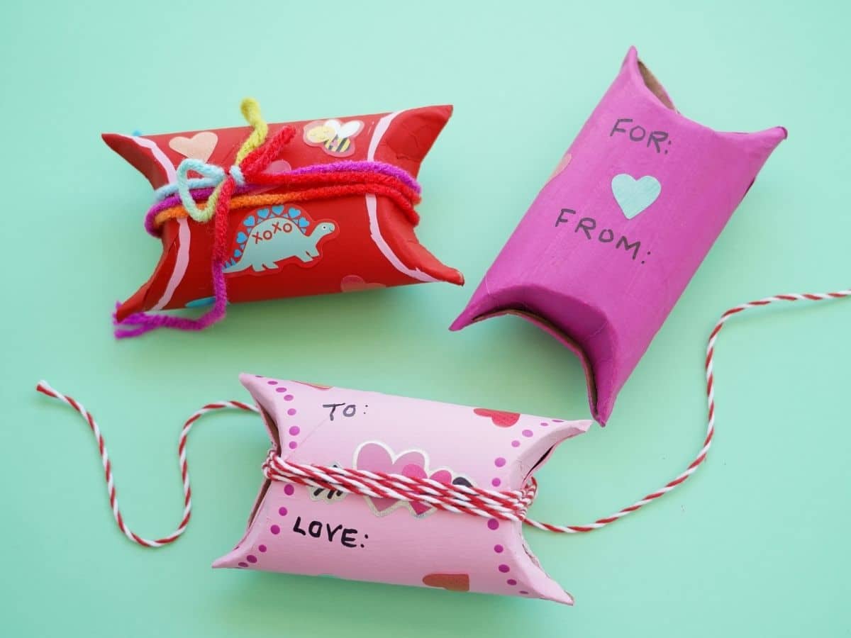three cute diy toilet paper roll valentine craft gift boxes with to and from written on them