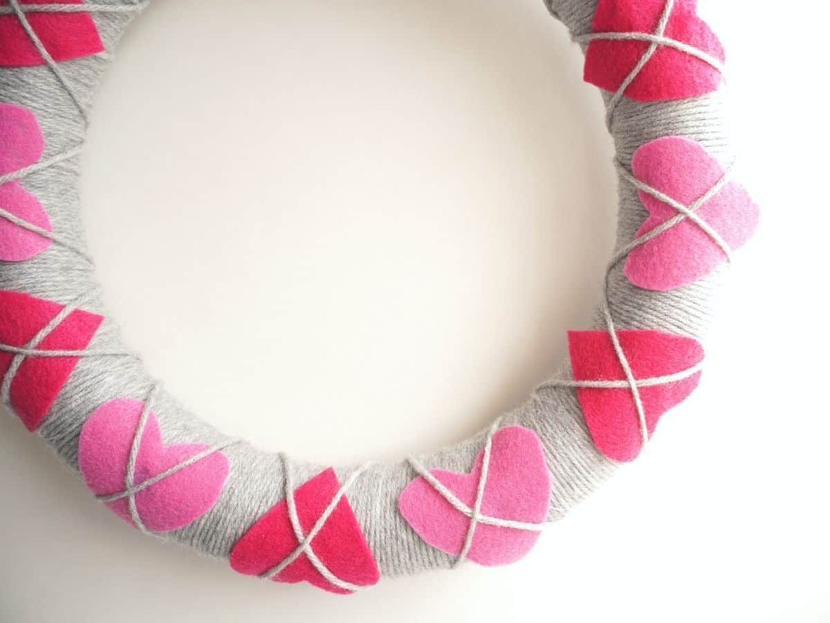 close up of pink felt heart argyle valentine wreath