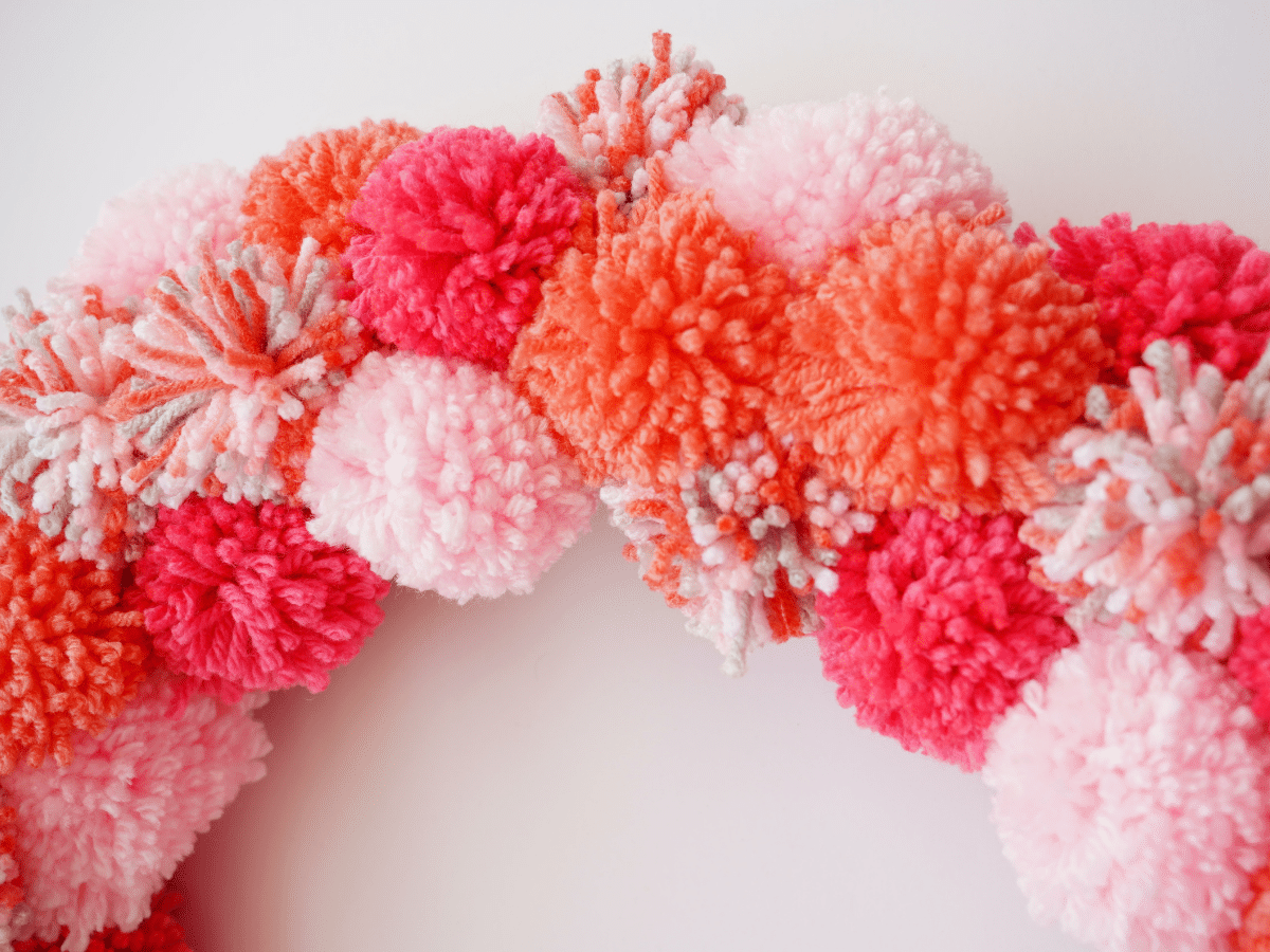 close up of valentines pom pom wreath