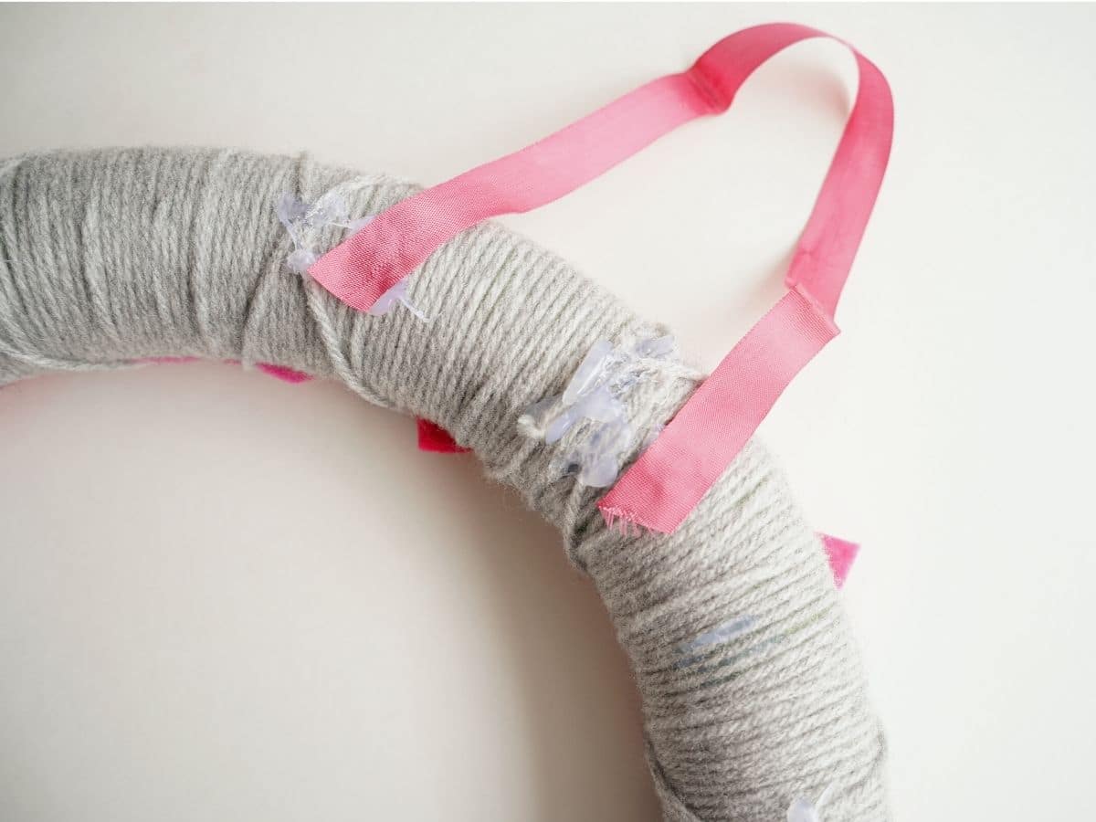 pink ribbon glued to back of heart argyle wreath