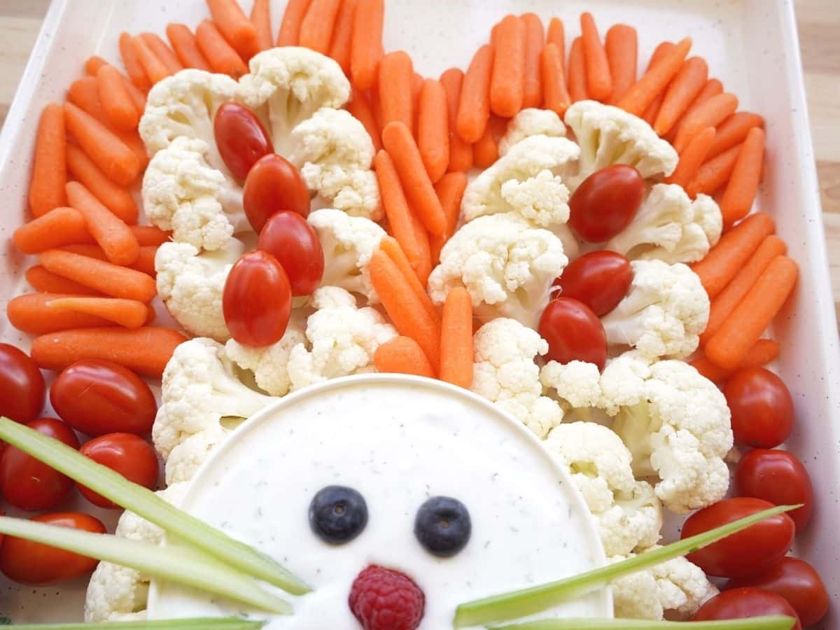 close up of easter bunny vegetable ears made from carrots
