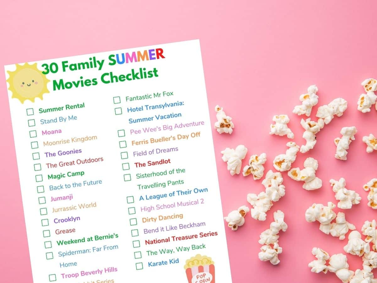 print out of family summer movie checklist with popcorn on pink background