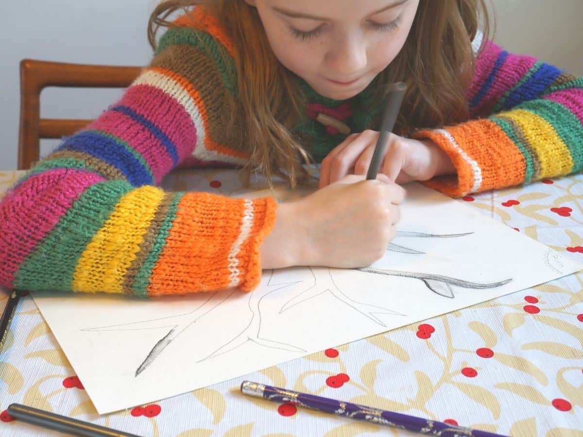 learn how to shade with pencils tween sitting at table with pencils and paper