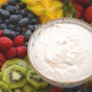 strawberry fruit dip in bowl with kiwi raspberries blueberries and starfruit