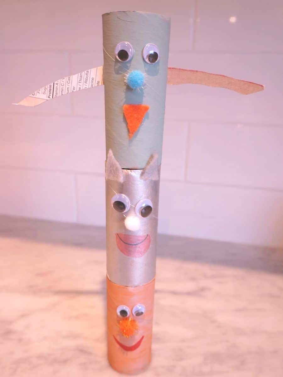 tait inspired totem pole art piece by tween 2 animals high totem pole