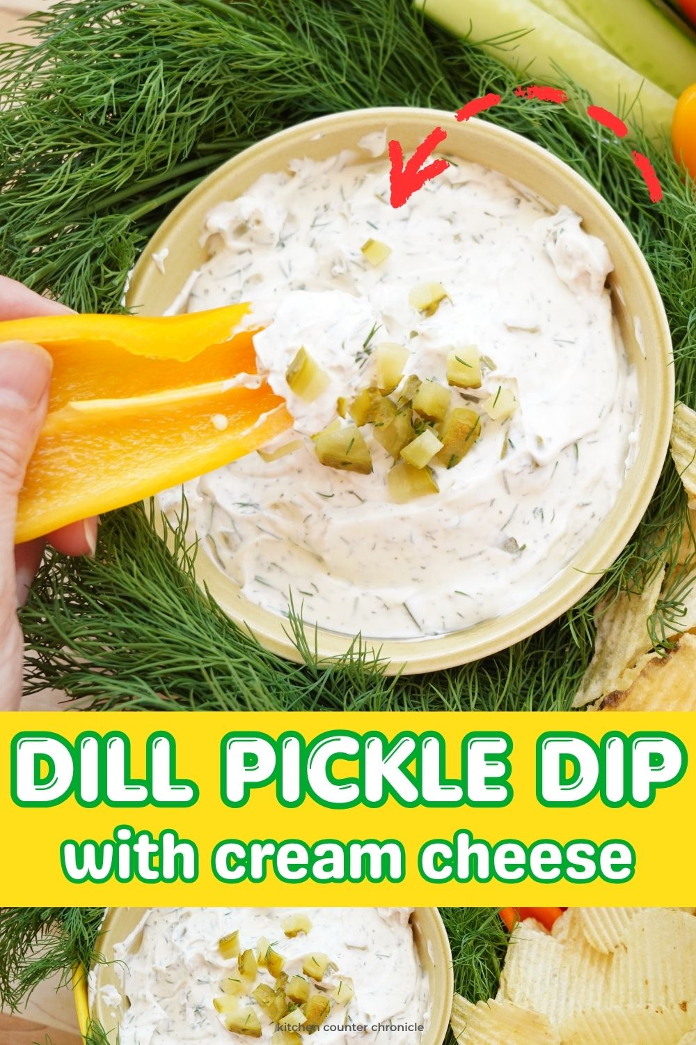 bowl of dill pickle dip with yellow pepper being dipped into dip