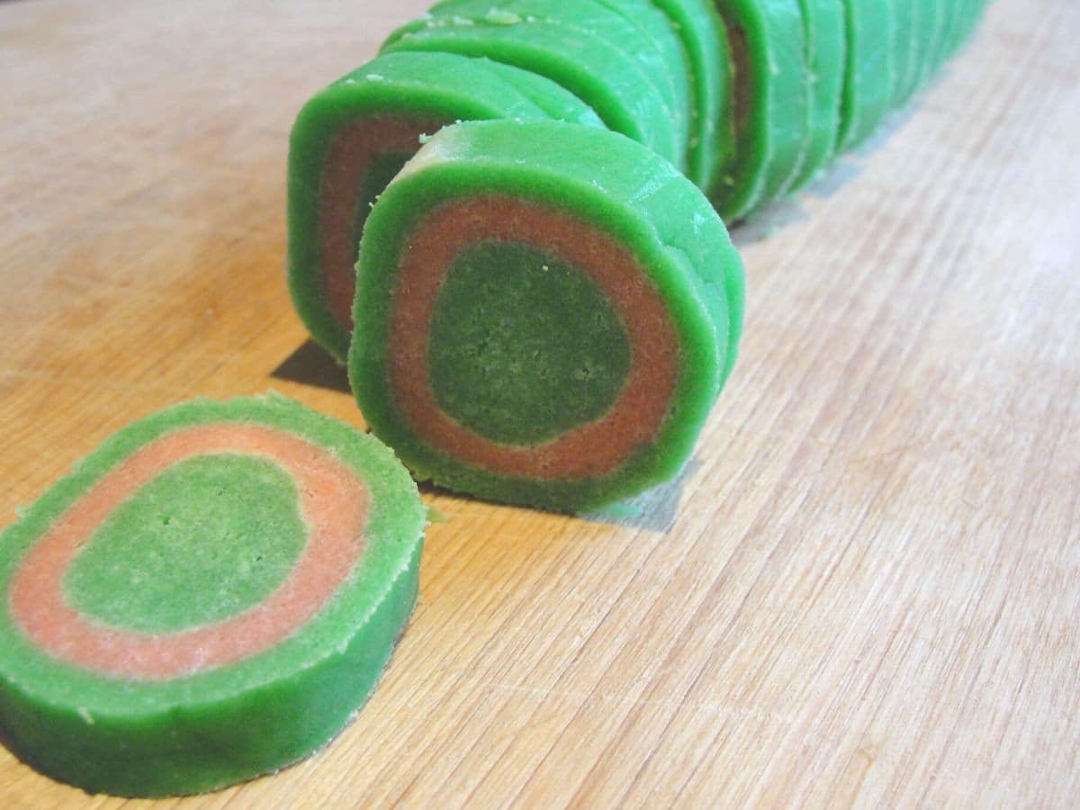 slices of christmas cookie log into individual cookies