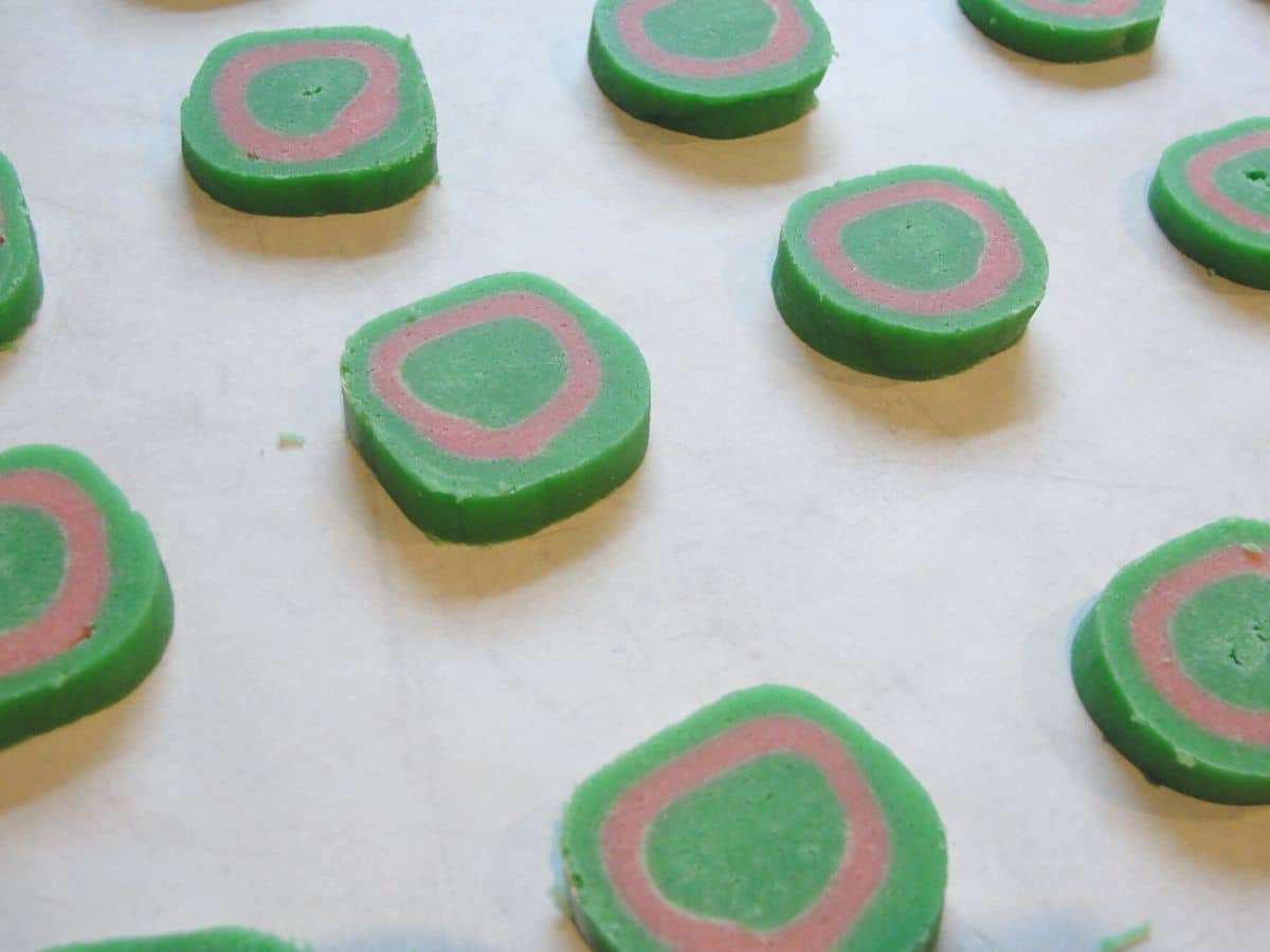 simple christmas cookies on parchment paper lined baking sheet 