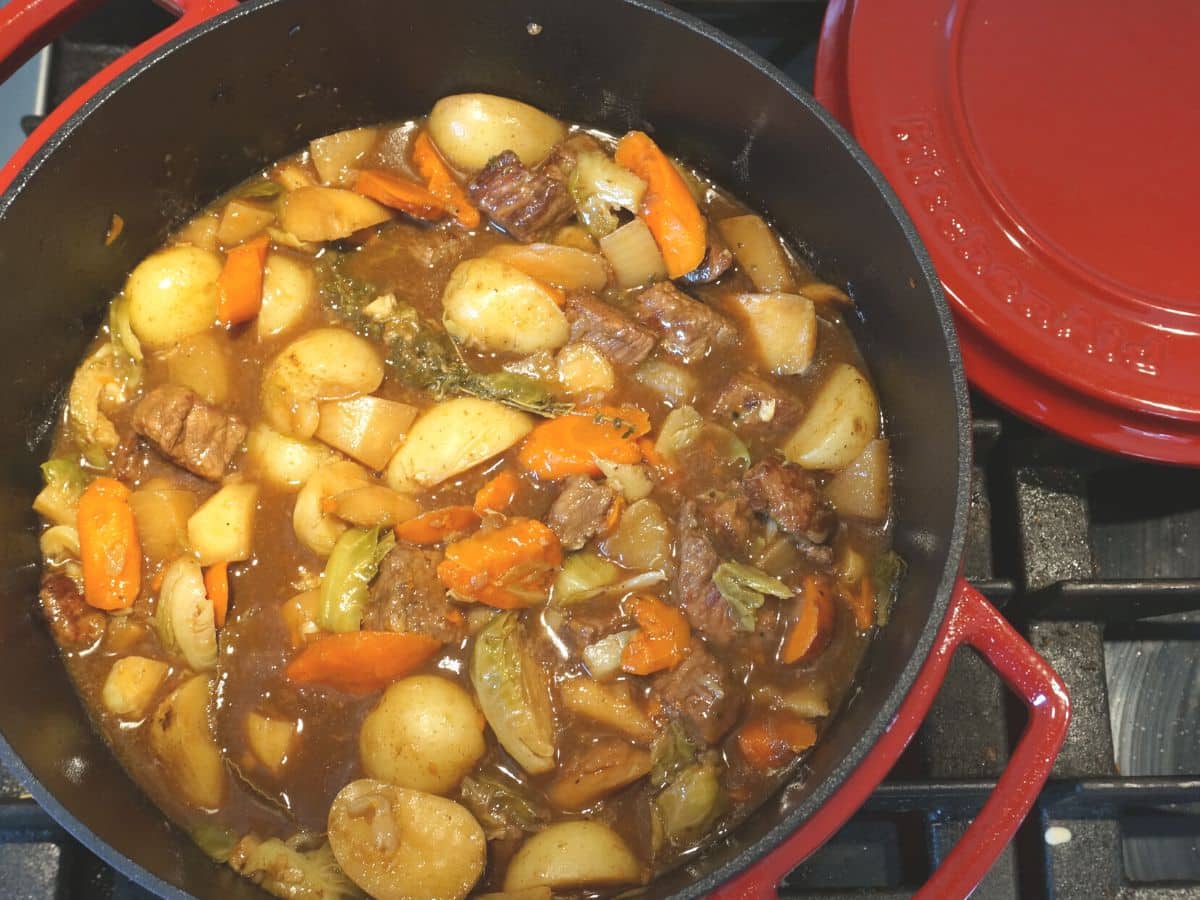 large dutch oven pot filled with hearty beef stew