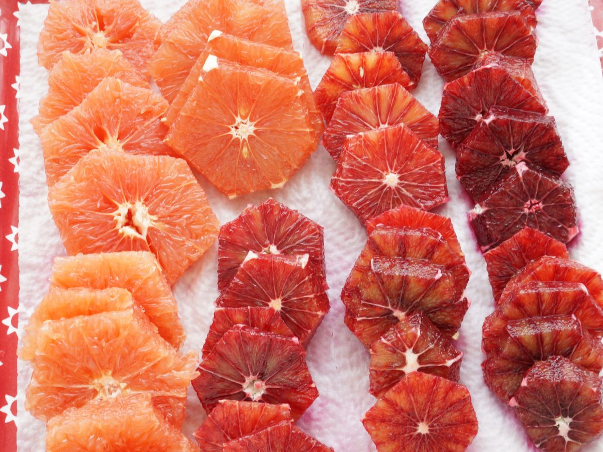 blood orange slices on paper towel lined tray