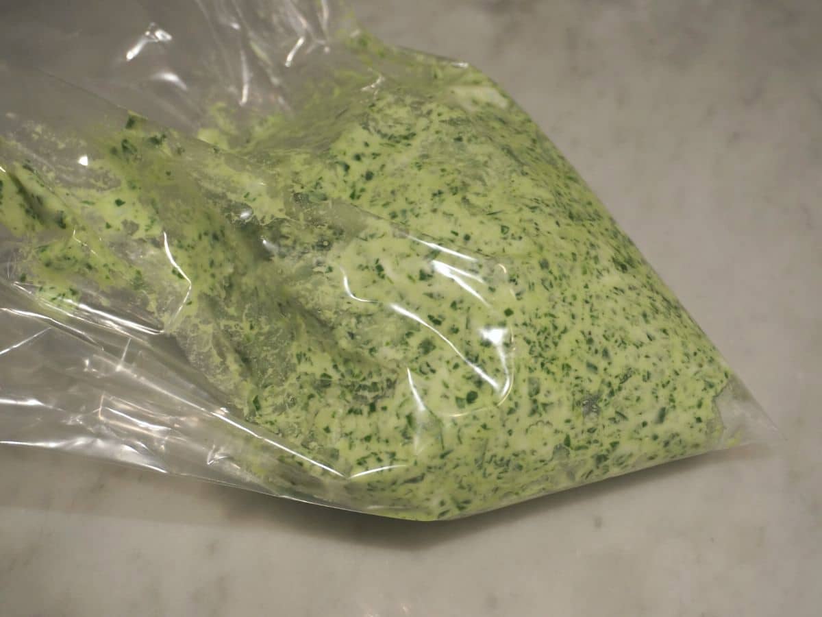 spinach for stuffed pasta shells in a resealable bag ready to pipe