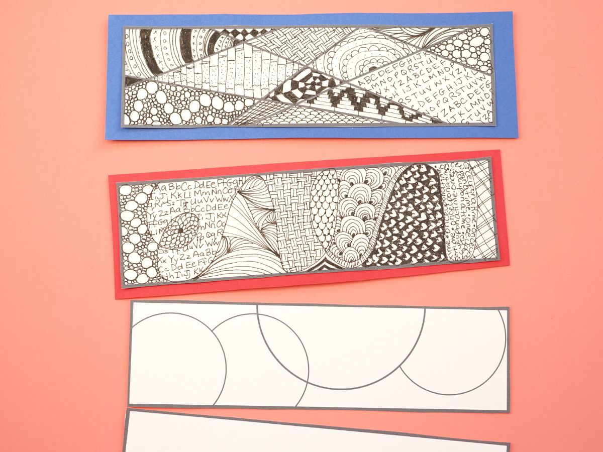 2 zentangle bookmarks with designs inside and 2 blank zentangle bookmarks
