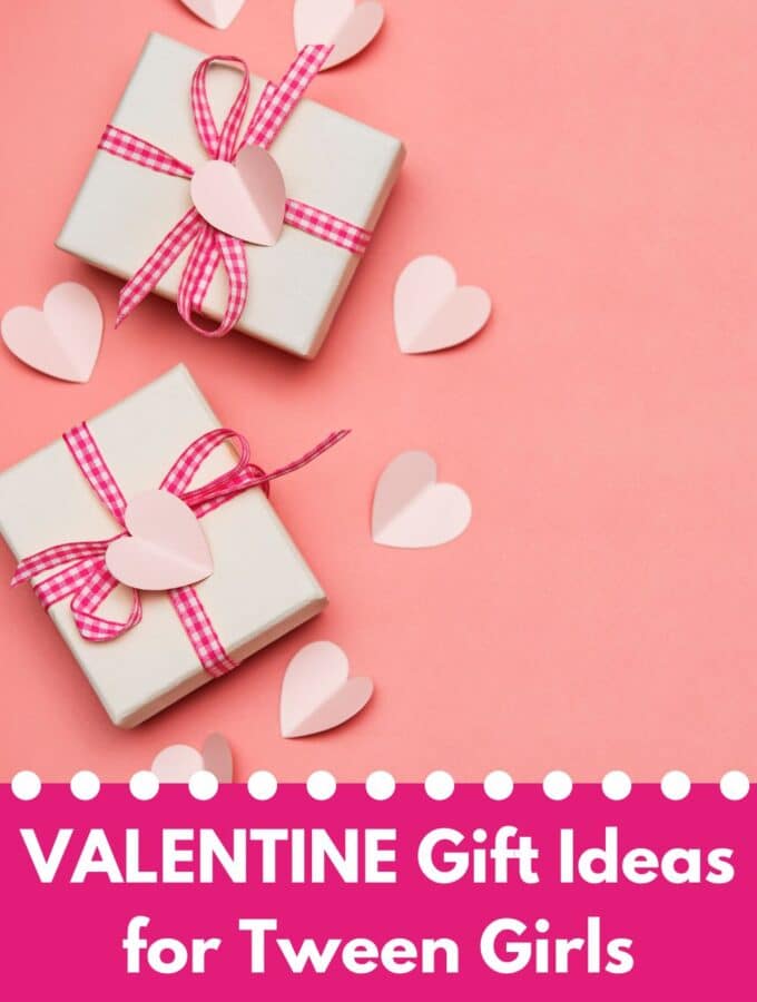 Pink background with paper hearts and two gift boxes and title "Valentine gift guide for tween girls"