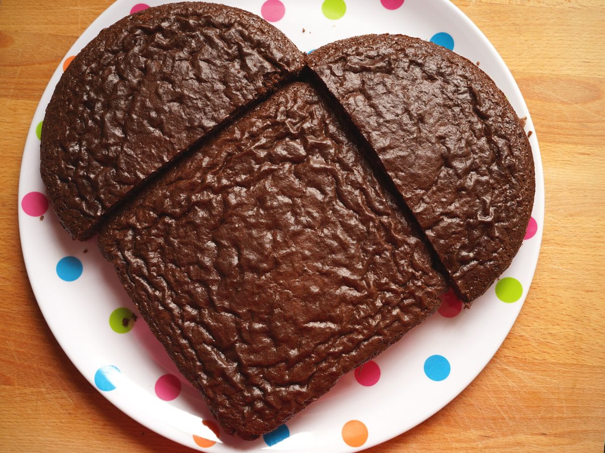 square chocolate cake and round chocolate cake cut into large heart cake