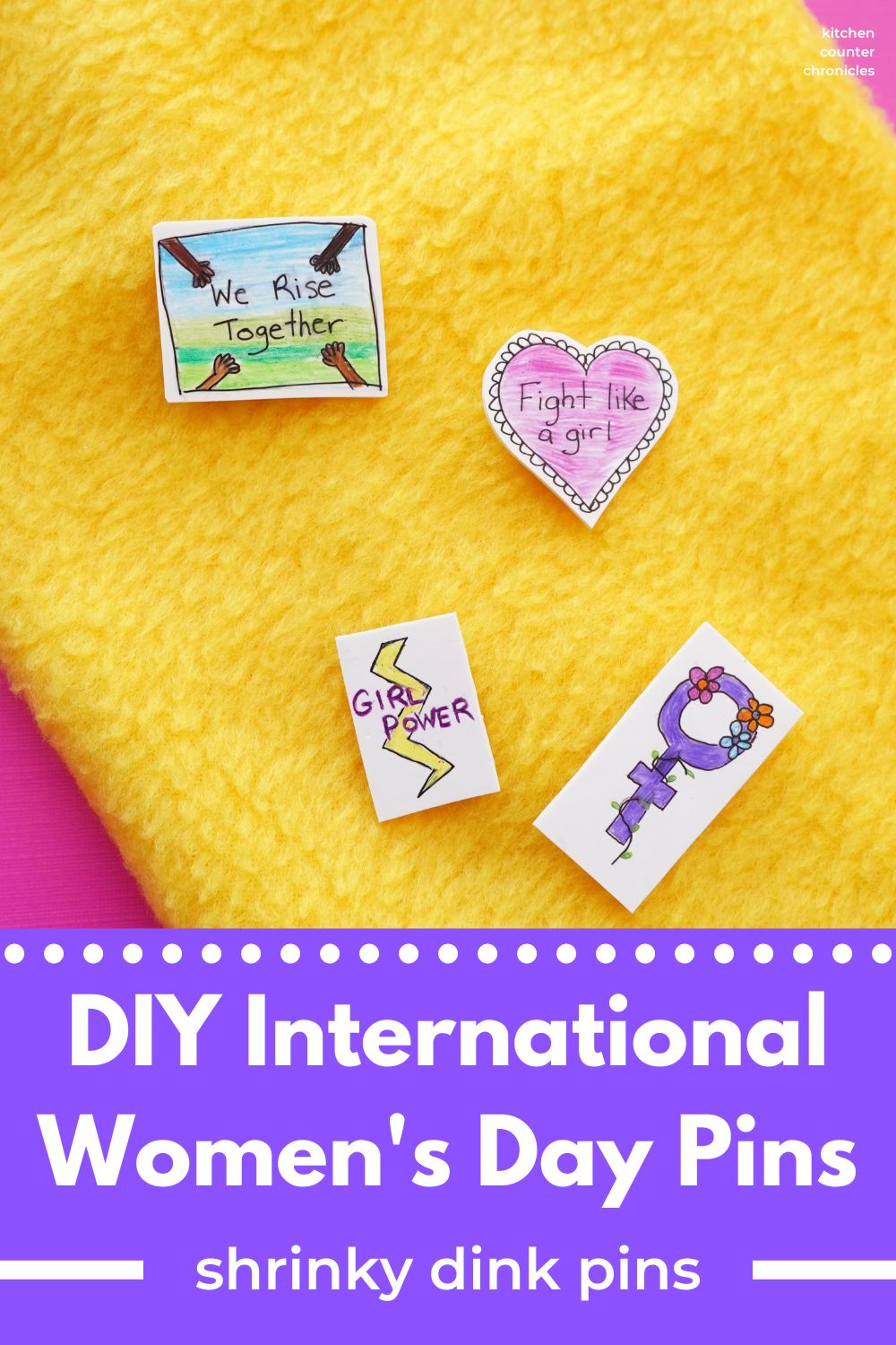 4 diy International Women's Day pins on a yellow scarf. One says "Girl Power", "Fight Like a Girl", "We Rise Together" and a purple woman symbol wrapped in flowers. With the title "DIY International Women's Day Pin - shrinky dink pin how to.