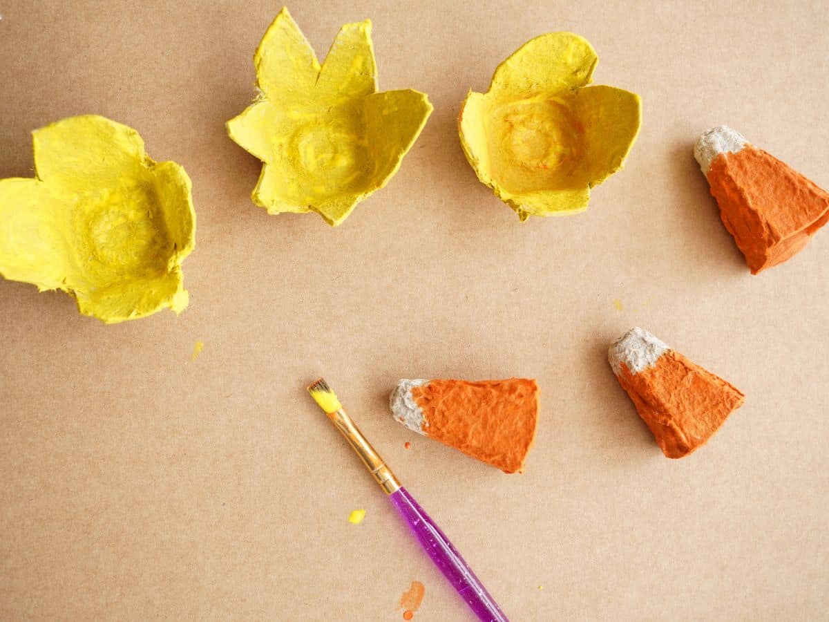 cardboard egg carton daffodil pieces painted with paintbrush
