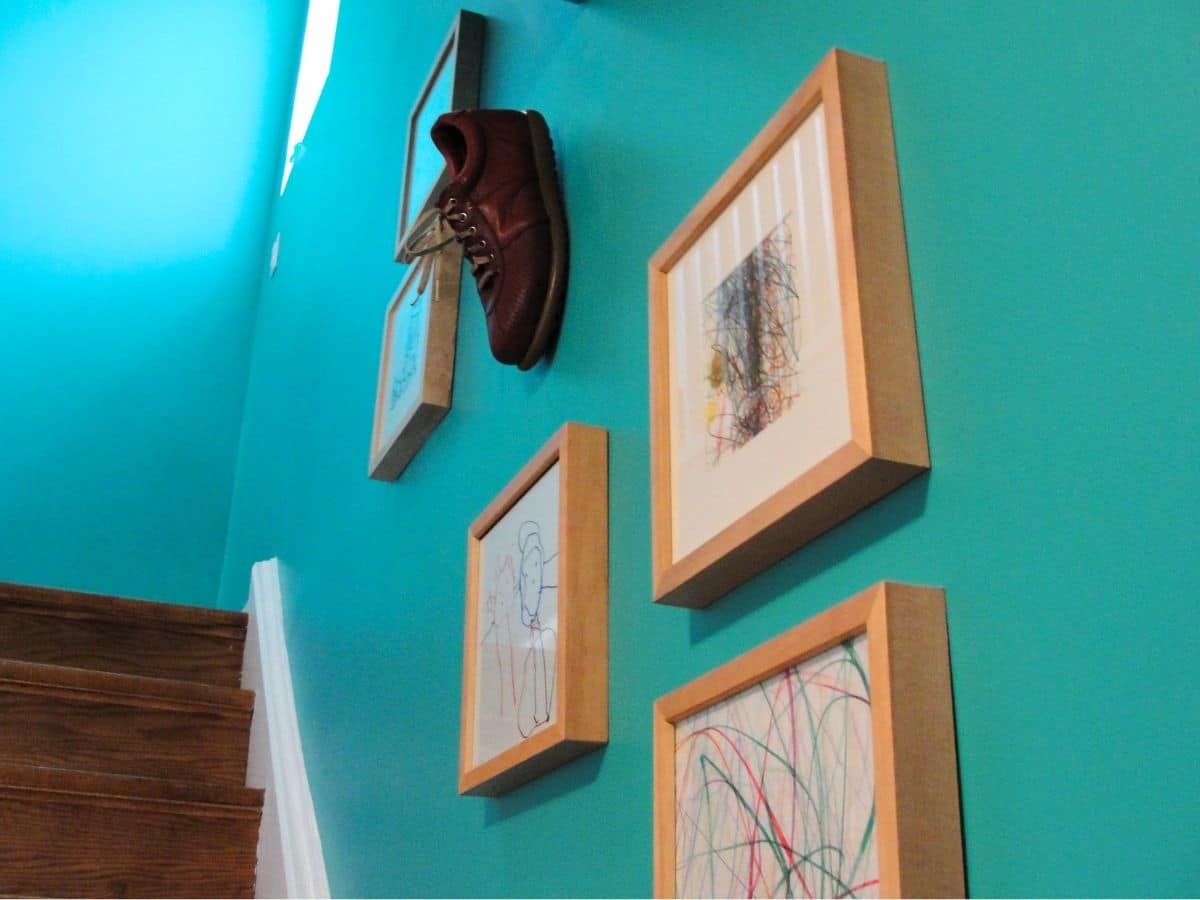 shoe on the wall with pictures