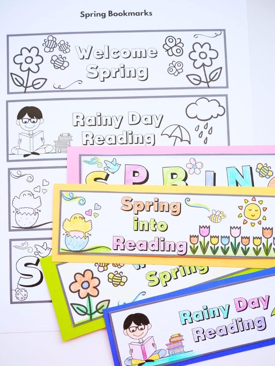 printable spring bookmarks with coloured spring bookmarks piled on top