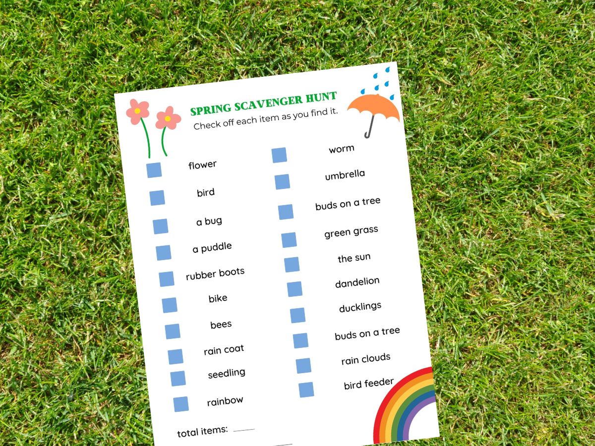 printable spring scavenger hunt printed and laying on the grass