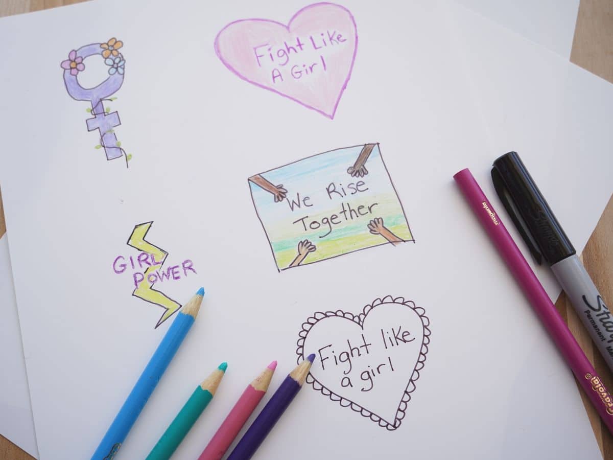 women's history month pins colored in on shrinky dink paper