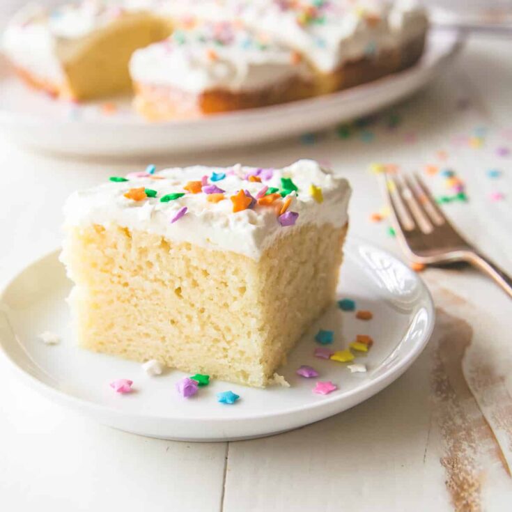 slice of vanilla cake with star sprinkles on top