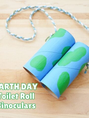 close up of toilet paper roll binoculars that are painted for an Earth Day craft