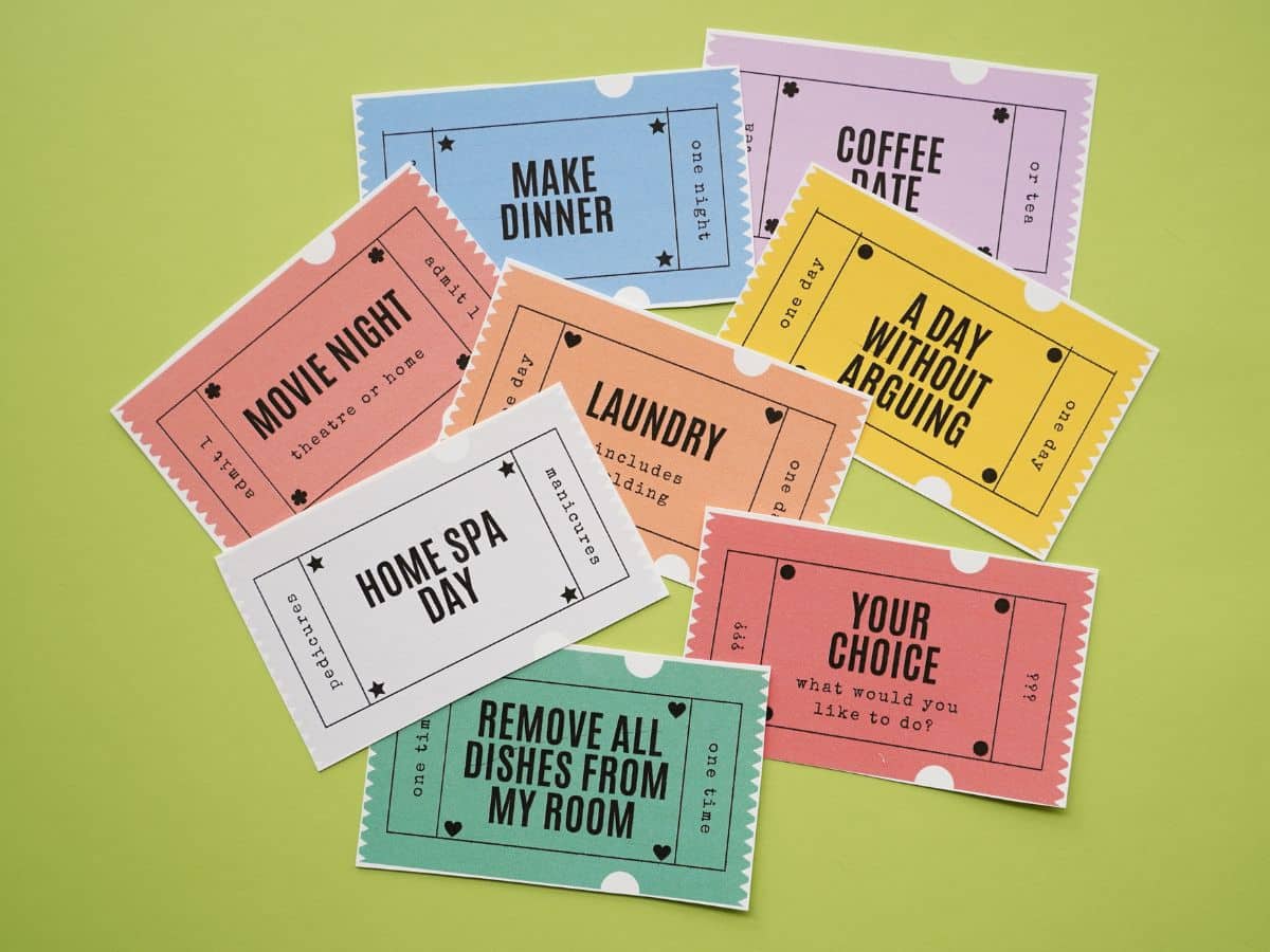 pile of Mother's Day coupons cut out on green table
