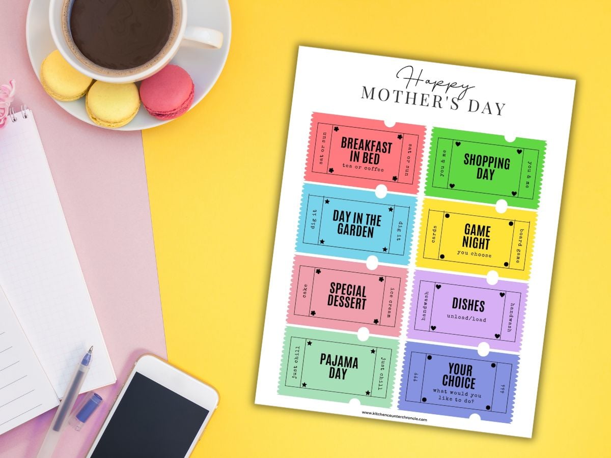 sheet of mother's day coupons for mom on yellow desk