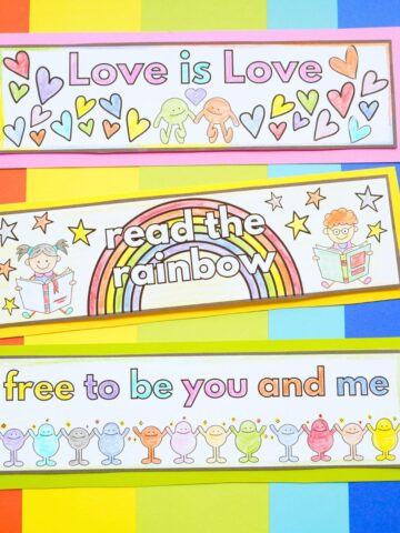 3 pride bookmarks printed and colored on rainbow background
