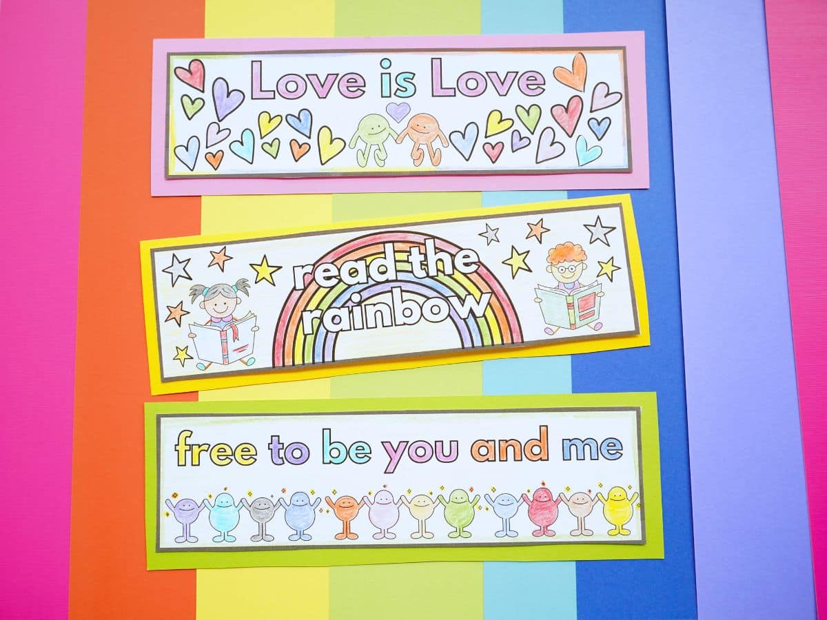 final pride bookmarks coloured and with a rainbow background