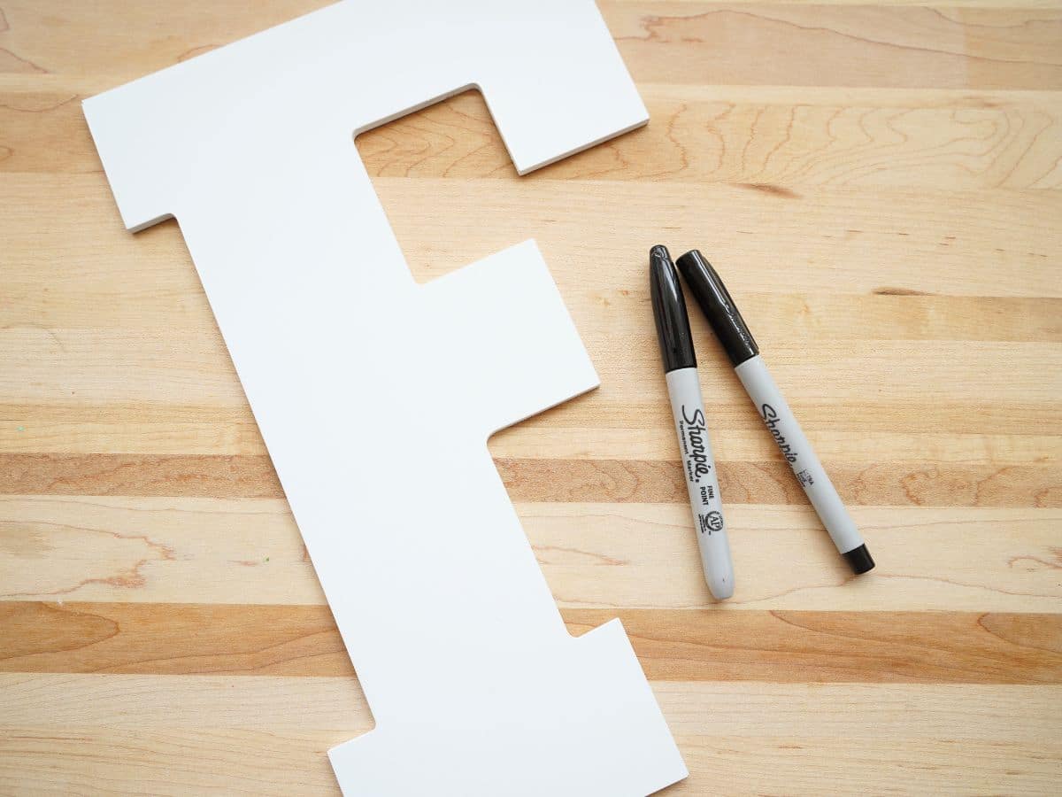 sharpie markers and wooden letter f supplies for zentangle art project
