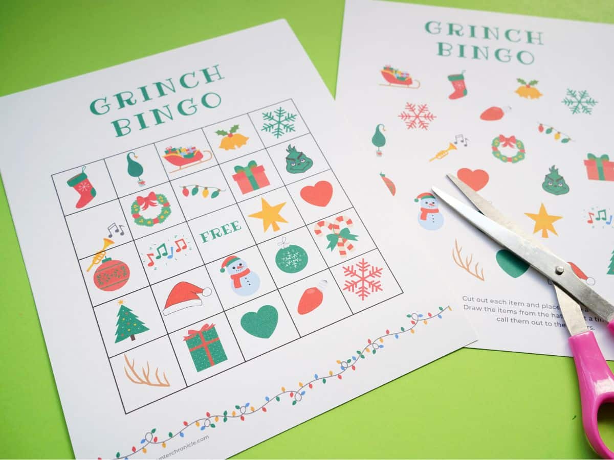 grinch bingo card printed out with pair of scissors