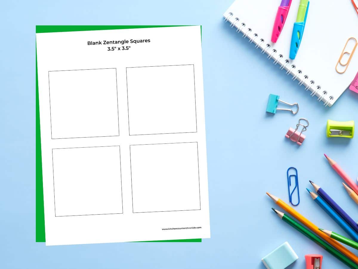 printable blank zentangle squares 3.5 on desktop with markers around
