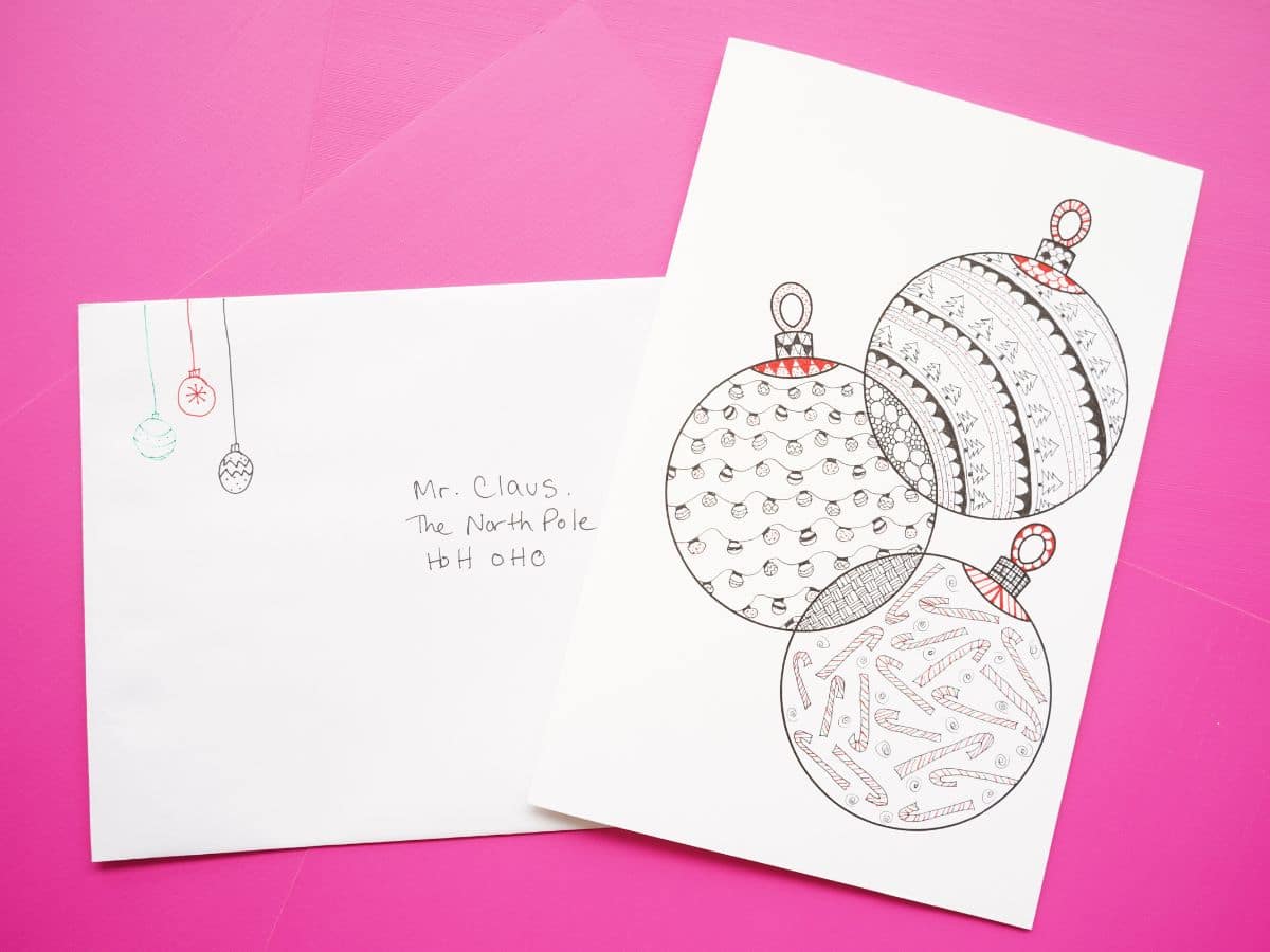 christmas ornament zentangle card with envelope that is for santa claus on pink background