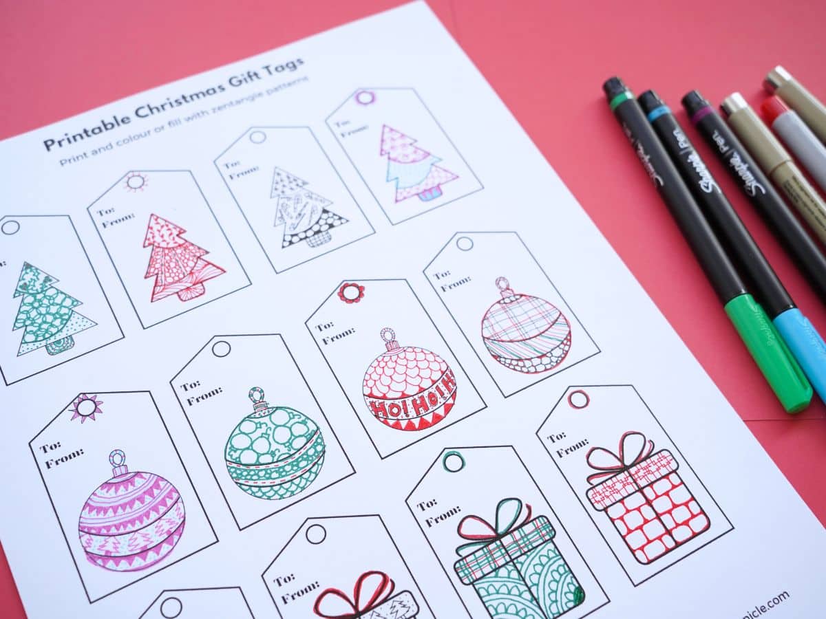 close up of printable zentangle christmas gift tags and ultra fine tipped markers