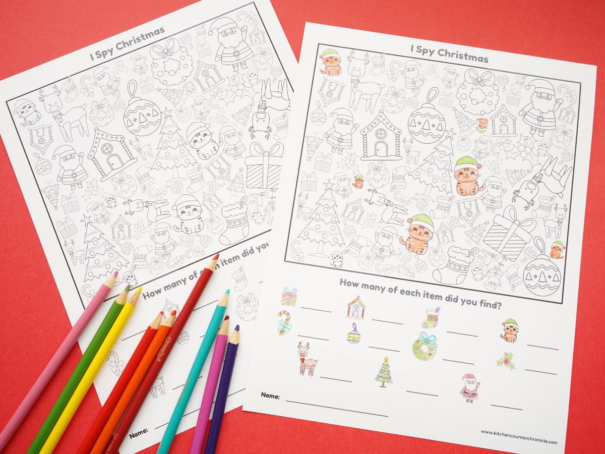 free printable Christmas i spy to color with pencil crayons on table