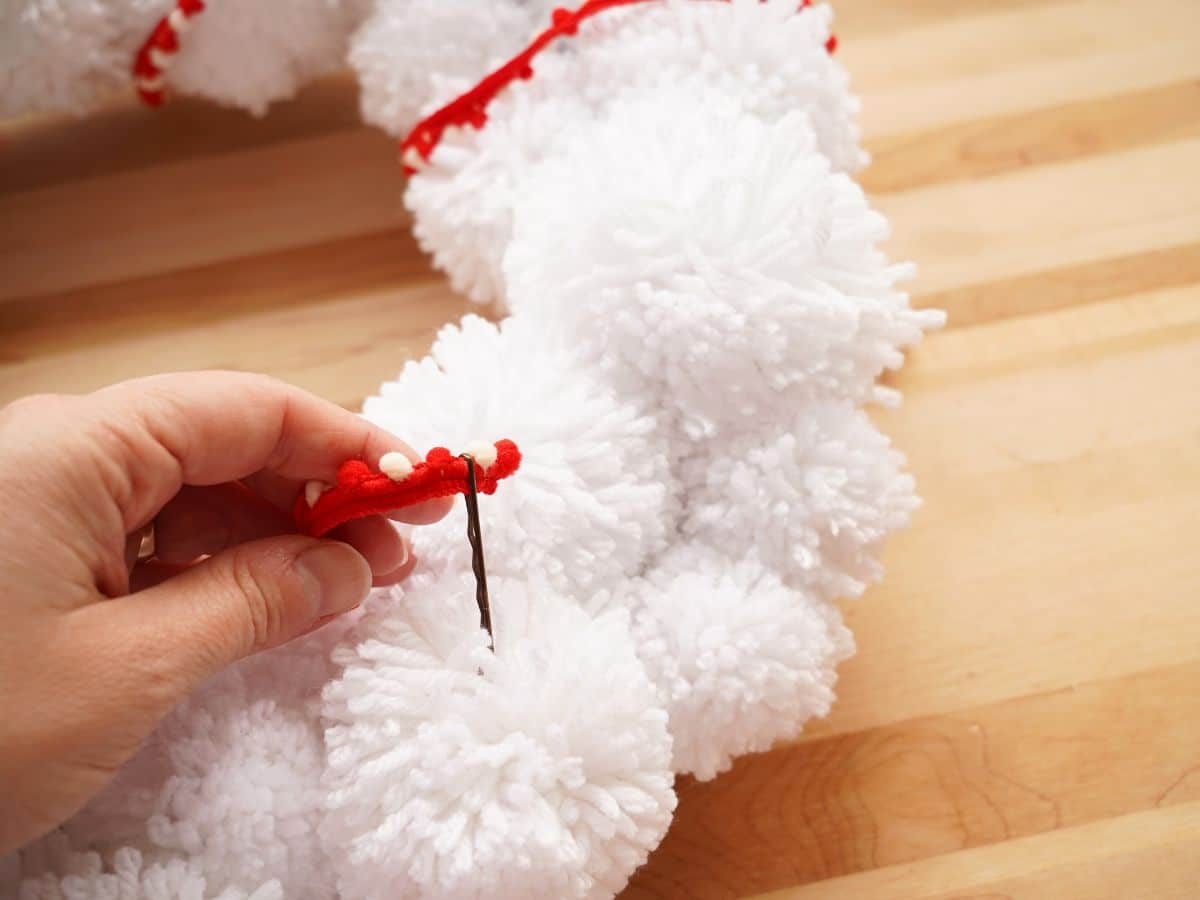 ribbon through hair pin for pompom wreath