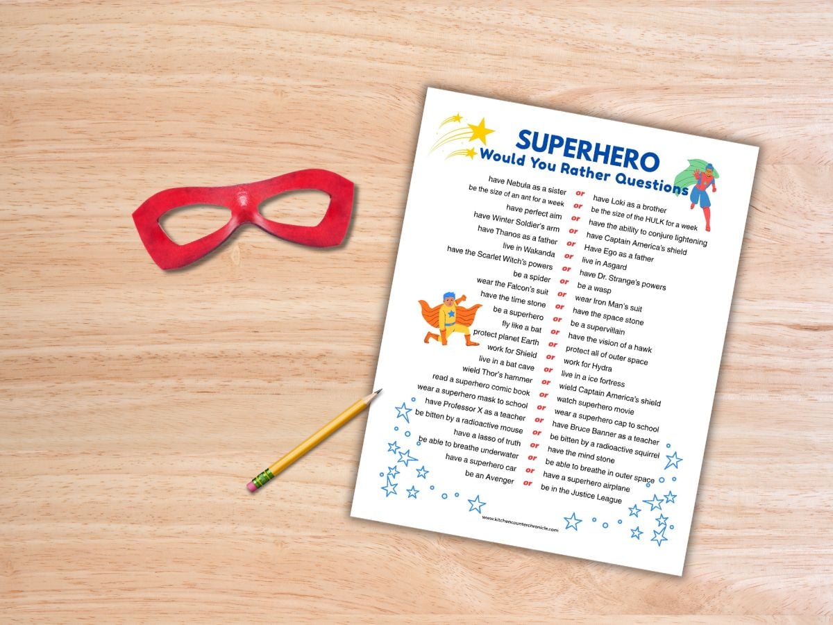 superhero would you rather printable on table with superhero mask and pencil